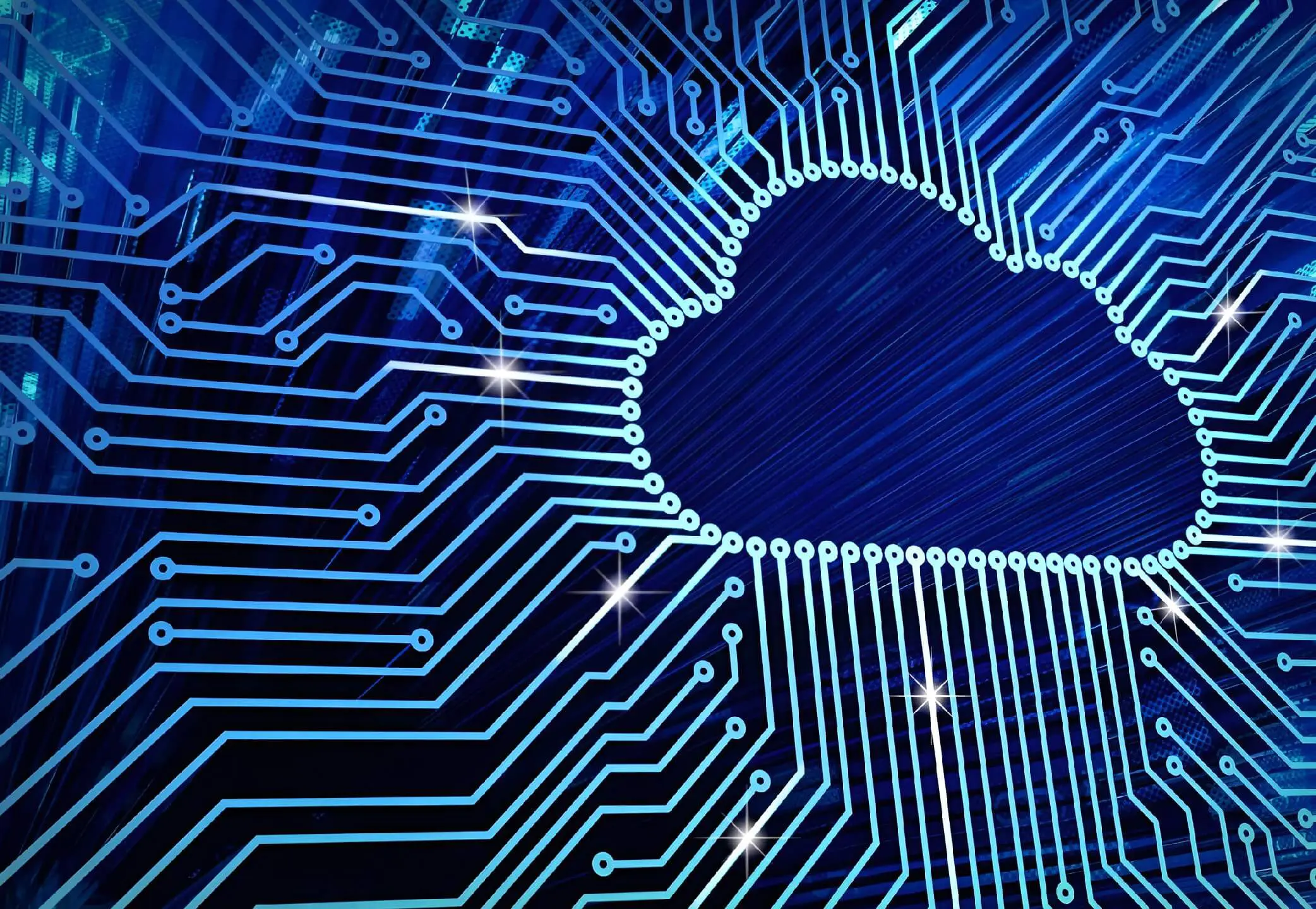 A computer circuit board with the cloud in the center.